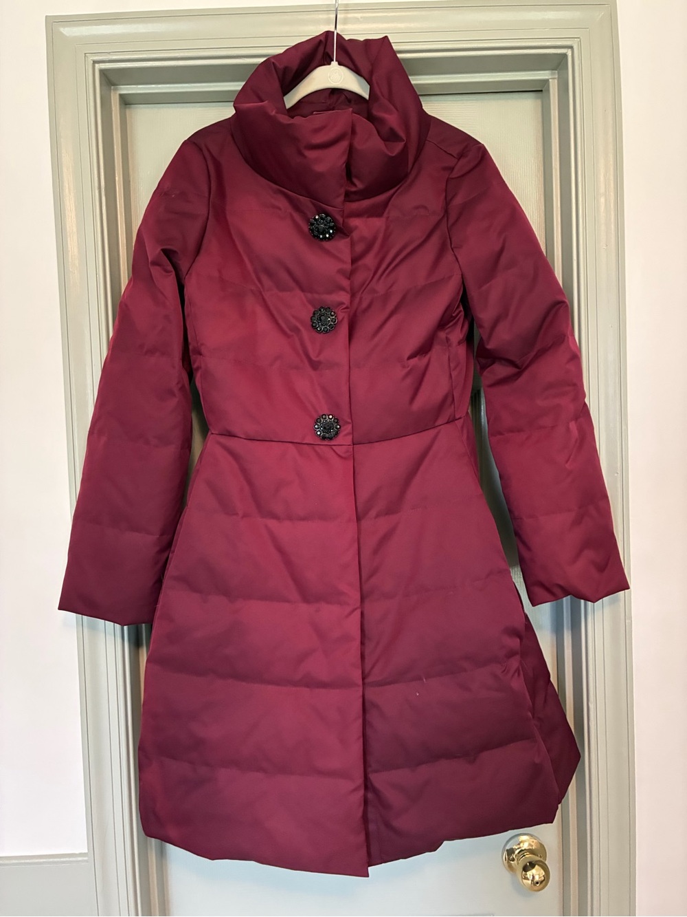 Kate Spade Burgundy Quilted A-Line down Coat with Decorative jeweled buttons.